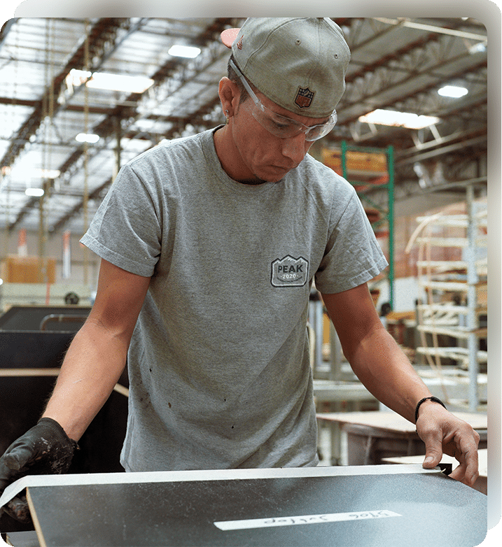 Forbes Industries manufacturing team member building hospitality equipment